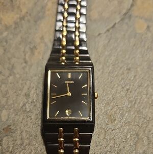 Seiko Black and Gold Rectangular Timepiece 7N29.  Japanese Quartz "Tank" Style